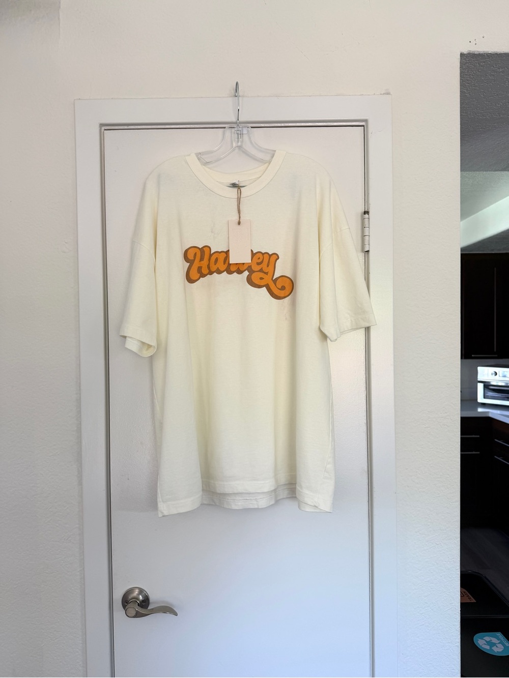 Harveys Cream Short Sleeve Oversized Tee with Orange Script Logo